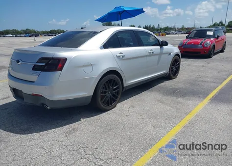 2015 Ford Taurus Limited z USA, uszkodzony, nr VIN 1FAHP2F87FG110430